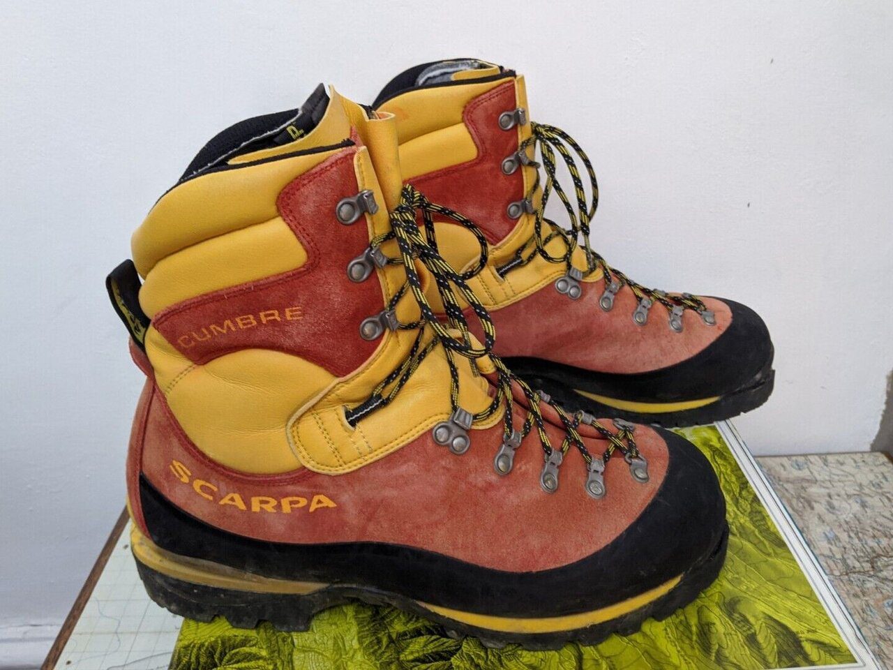 a brand new pair of Scarpa Cumbre mountaineering boots sitting on their box